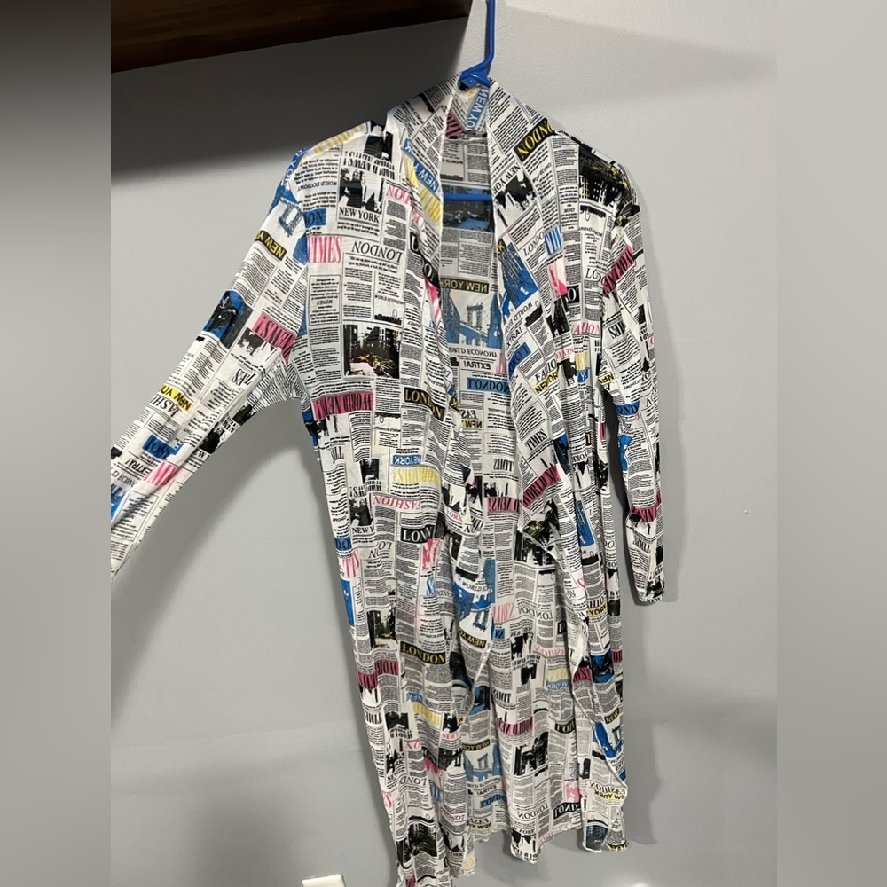 Long cardigan multi color. Brand is Wearever. Size is XL